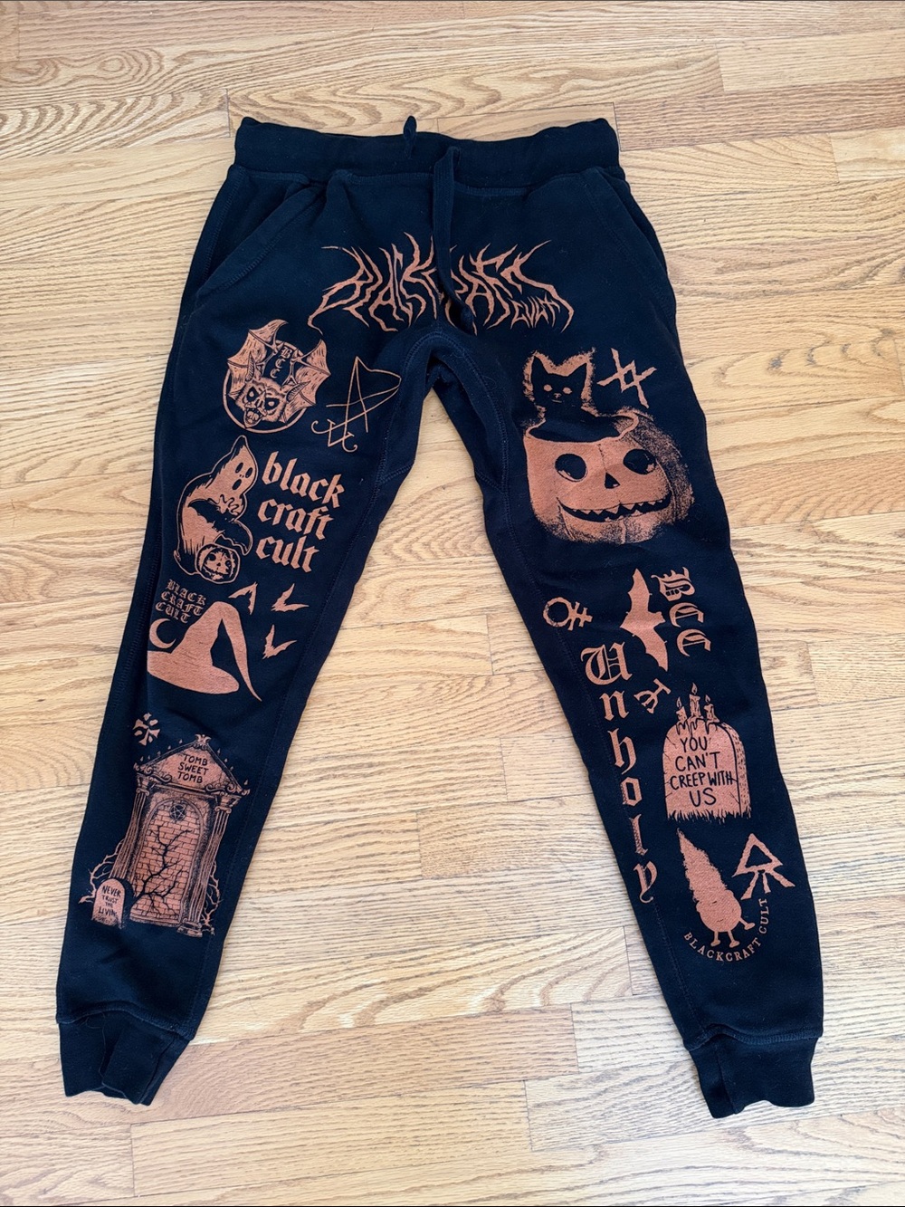 Blackcraft Cult Jogger Sweatpants with Orange Print